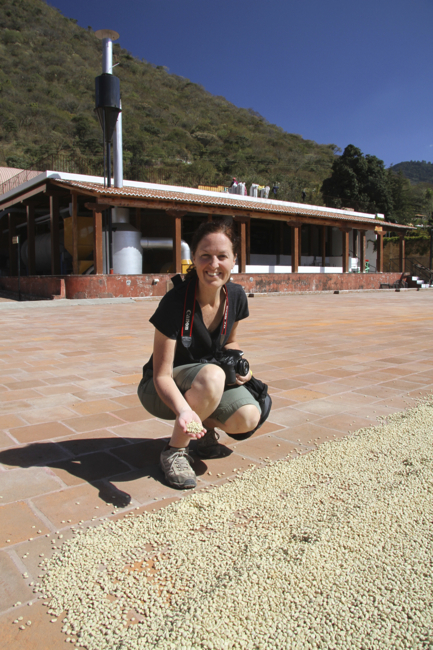 Alison inspects the product.